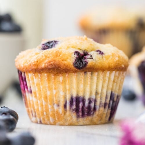 blueberry muffin on white marble