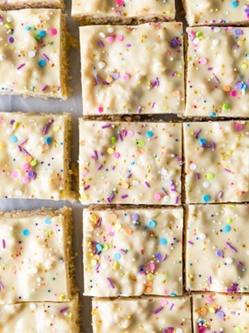 Overhead view of cake batter rice krispie treats after cutting into squares.