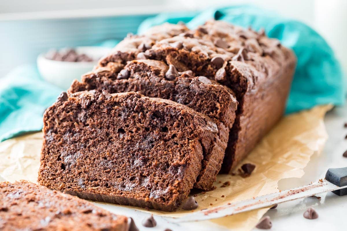 chocolate loaf bread with two slices that have been cut