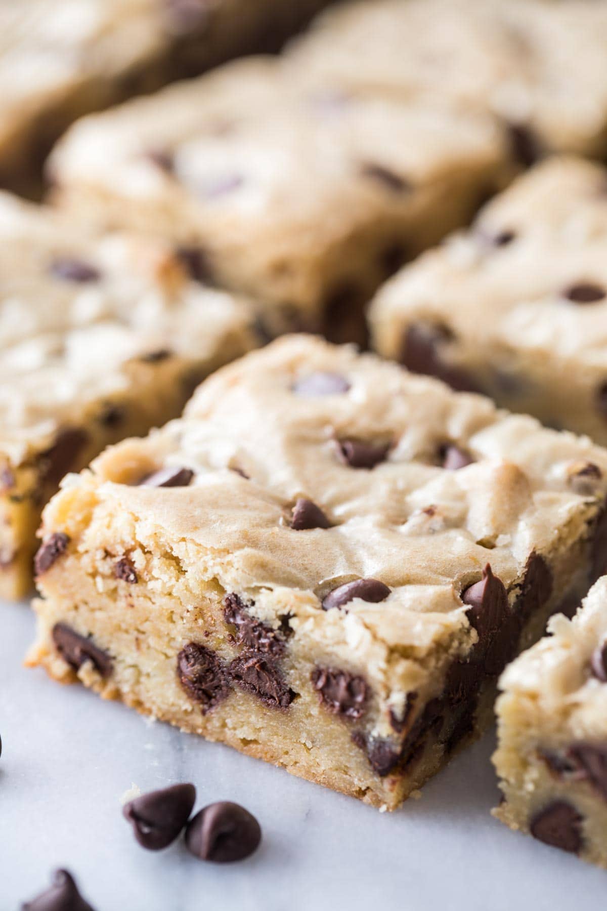 sliced chocolate chip cookie bars neatly arranged in rows