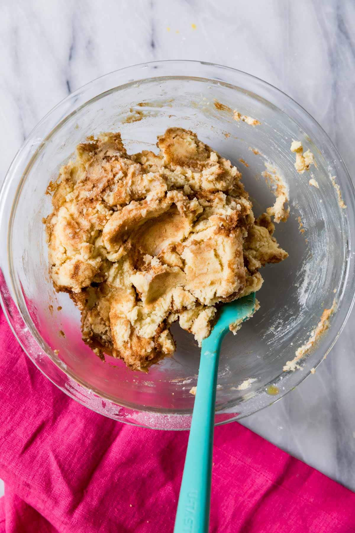 Overhead view of a bowl of cinnamon cookie dough.