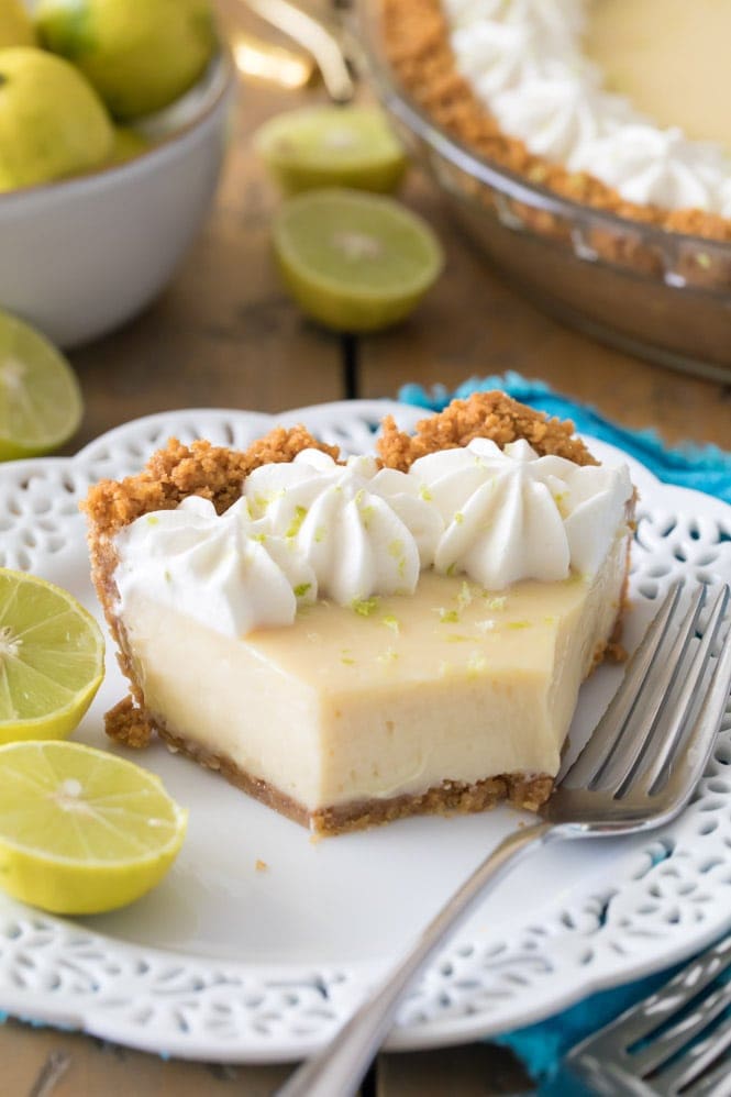 half-eaten pie on white plate (showing creamy center)