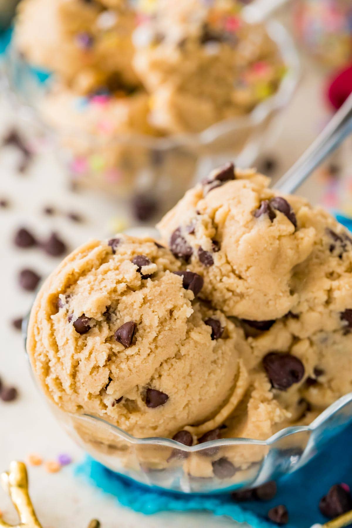 clear bowl full of scoops of edible cookie dough