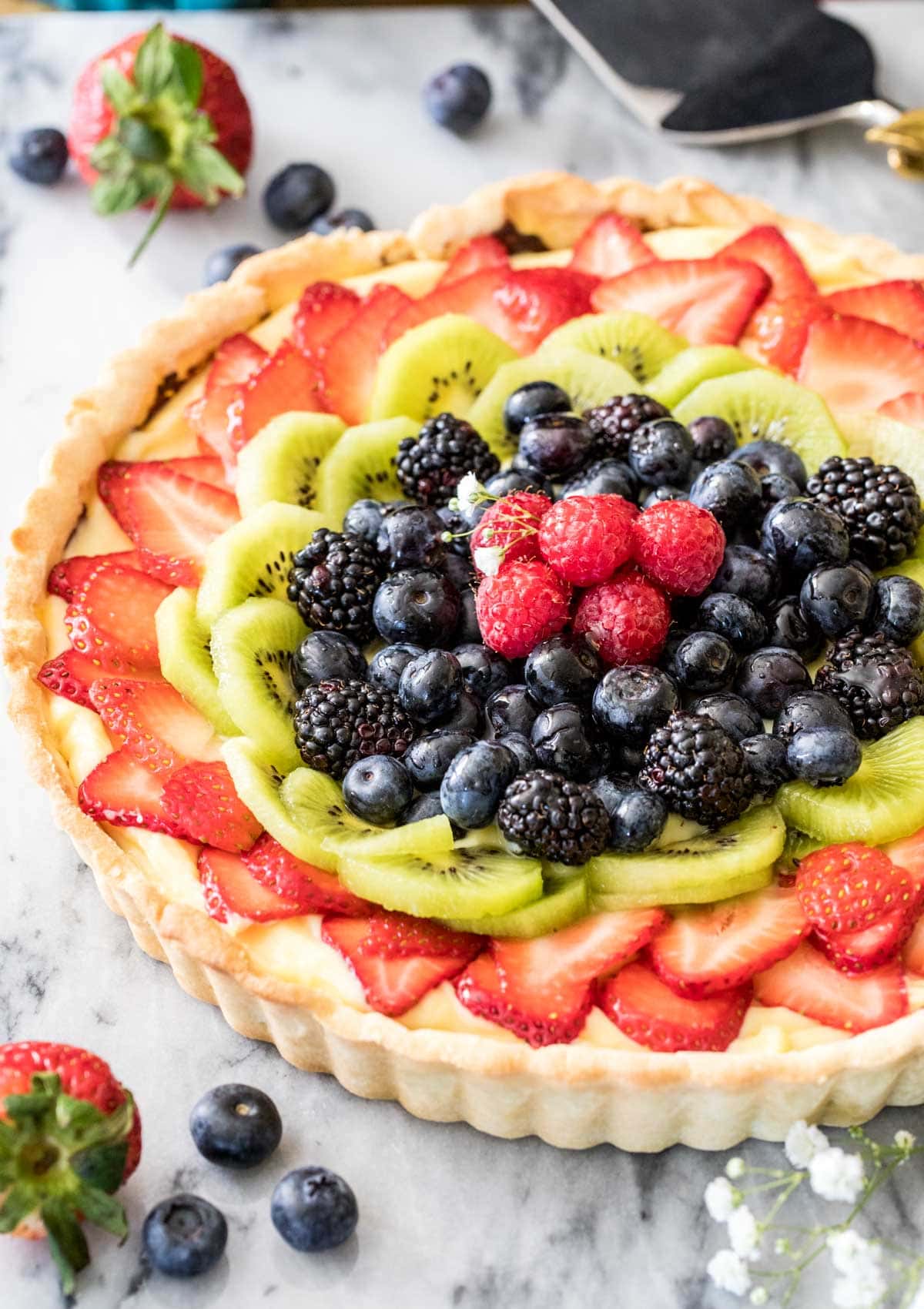 fruit tart on marble board