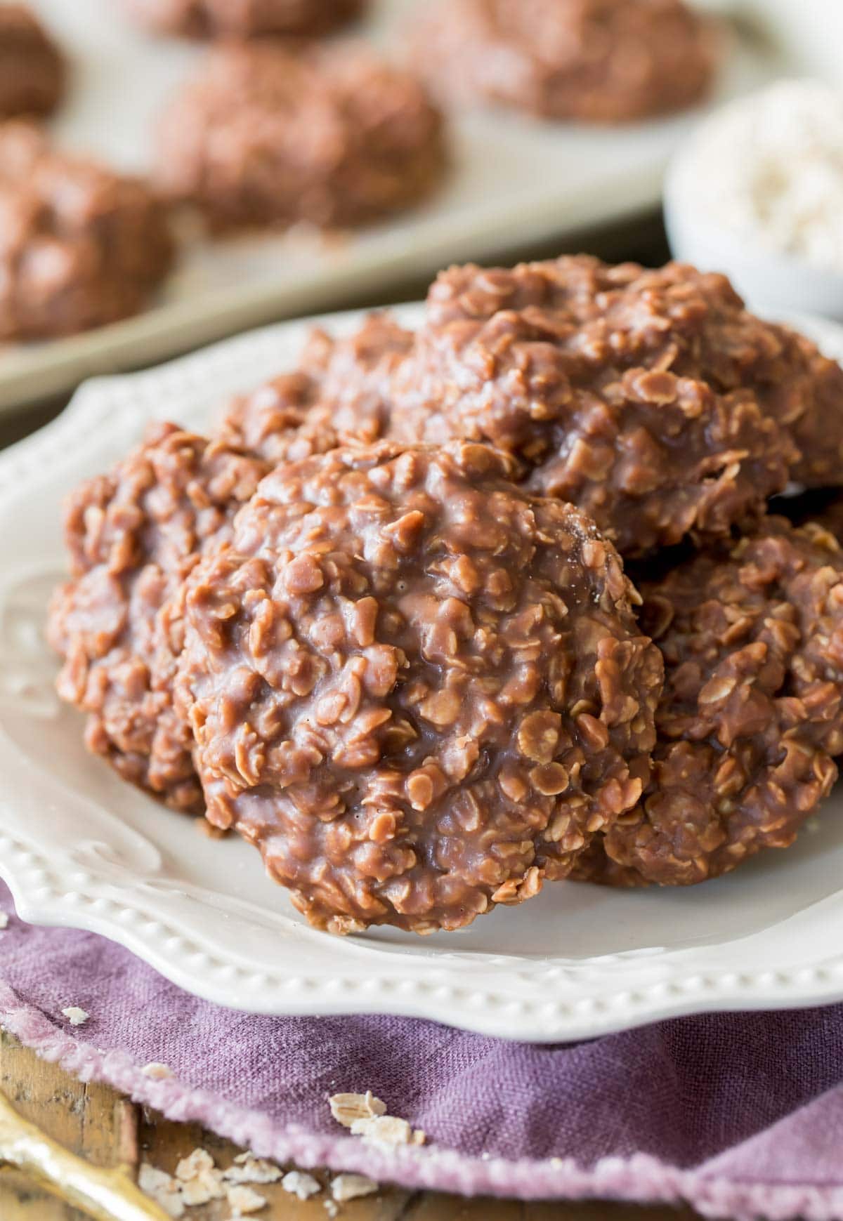 white decorative plate piled with no-bake cookies