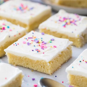 neatly cut frosted sugar cookie bars arranged in rows