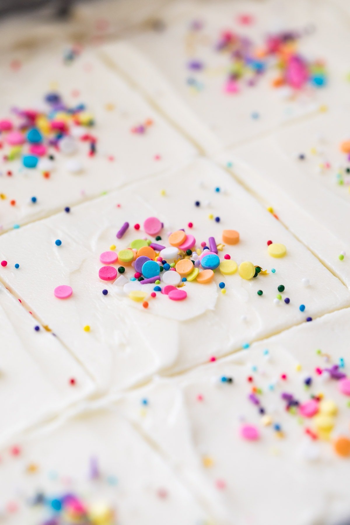 frosted and decorated sugar cookie bars just after cutting