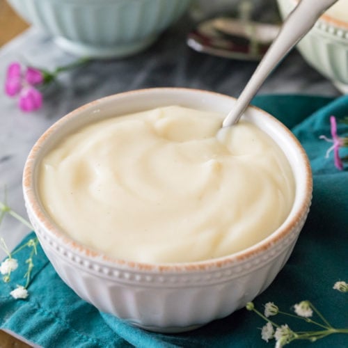 Vanilla pudding in bowl on blue towel